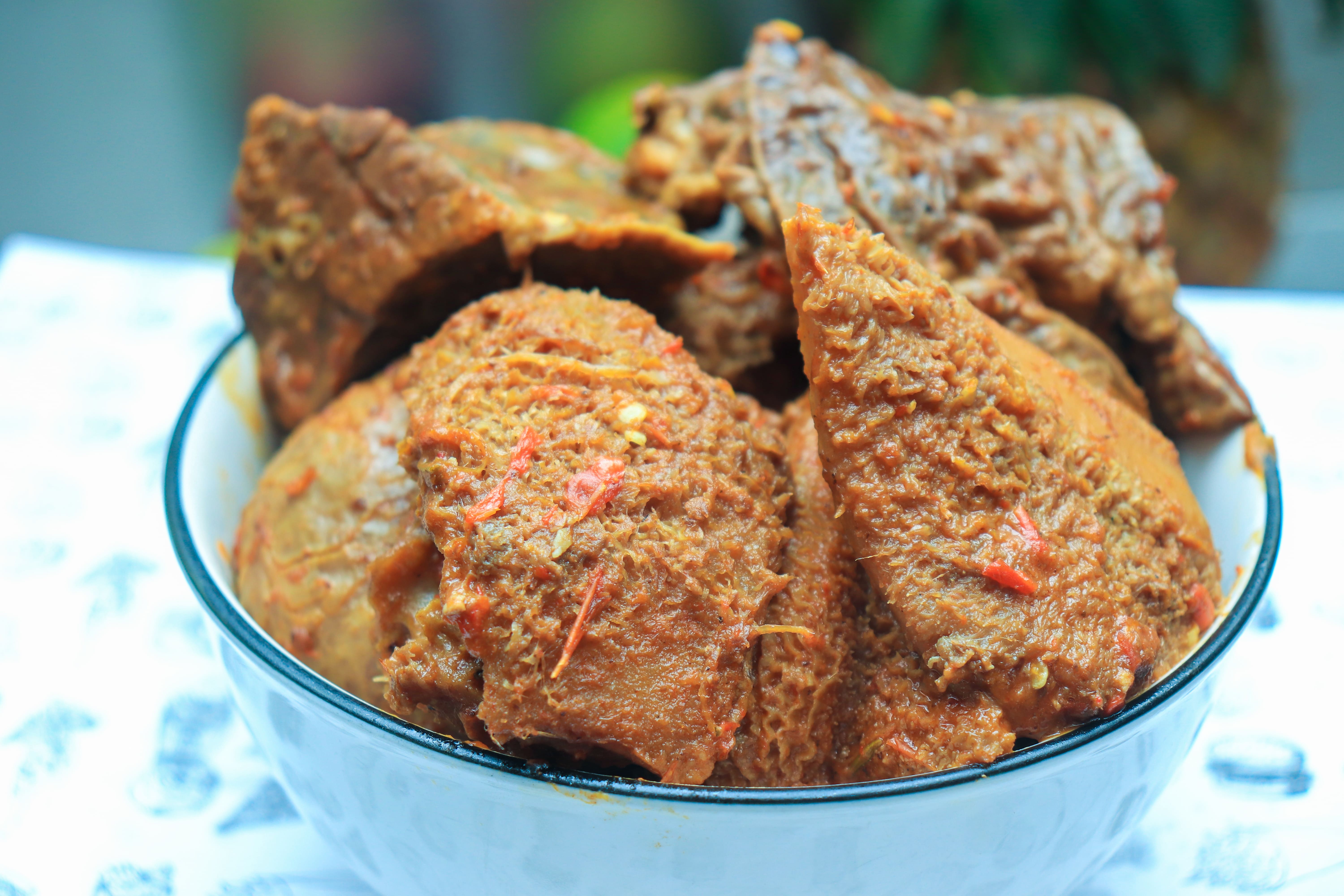 A traditional Nigerian dish with assorted meats, served at Blossom P